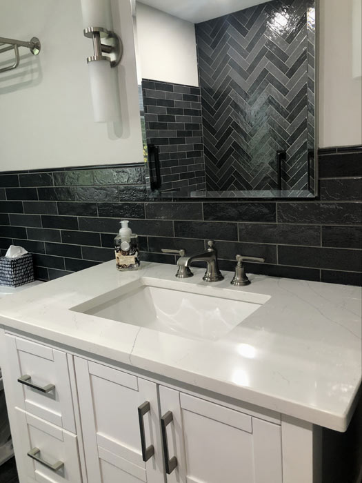 Guest bathroom with a freestanding tub and floating vanity