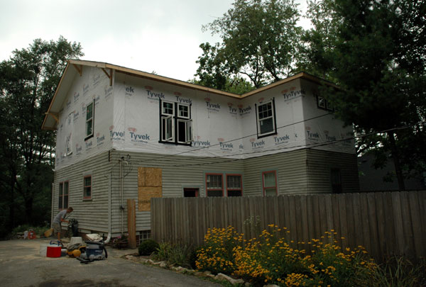 Two-storey home addition matched to the existing roofline and siding
